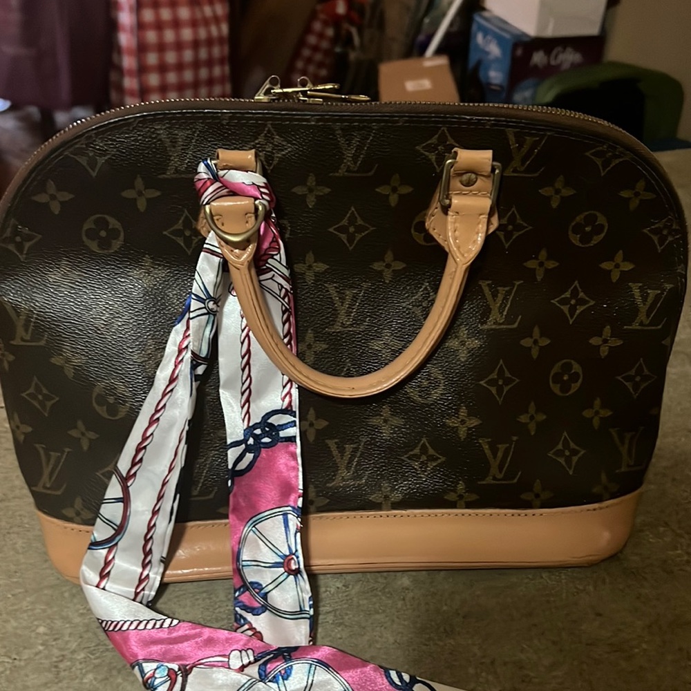 Louis Vuitton Alma bag